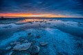 Rise Over Icy Lake