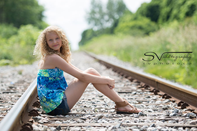 blonde teen on railway portrait