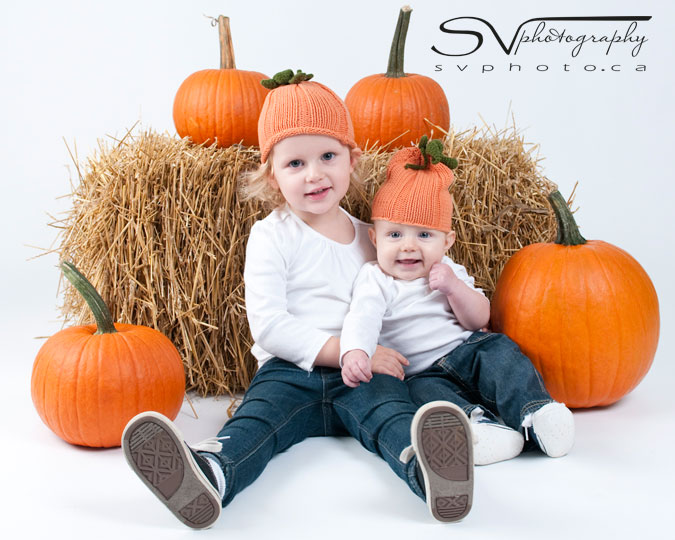 sisters-with-pumpkins