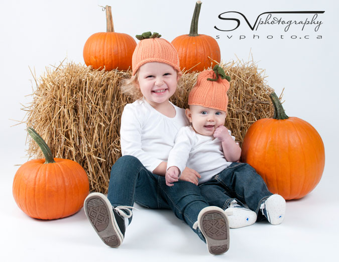 two-sisters-with-pumpkins
