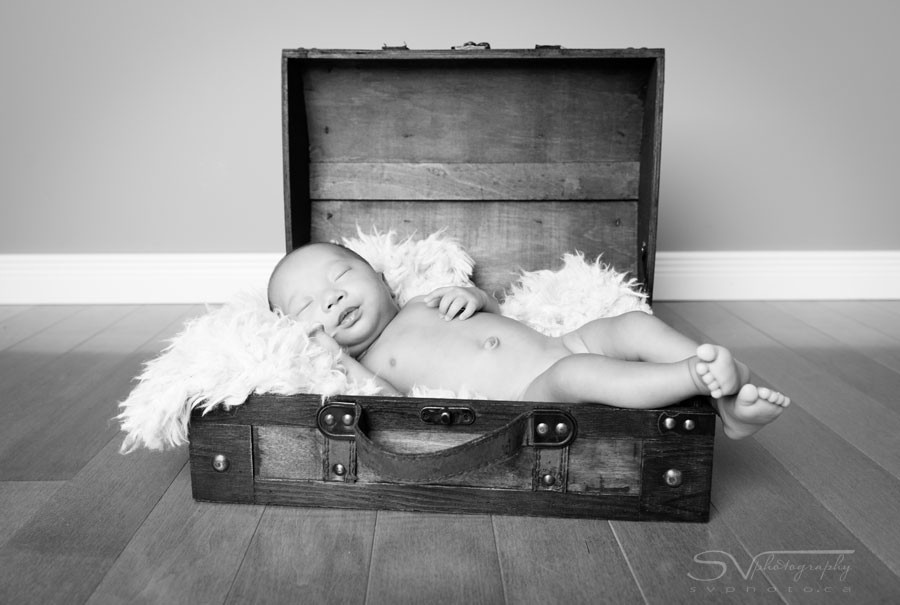 newborn baby in treasure chest