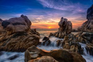 unearthly rock formations dramatic sky sunrise cabo