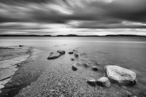 long exposure black and white landscape rocks and water