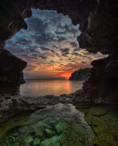 sunrise inside a cave at bruce peninsula national park